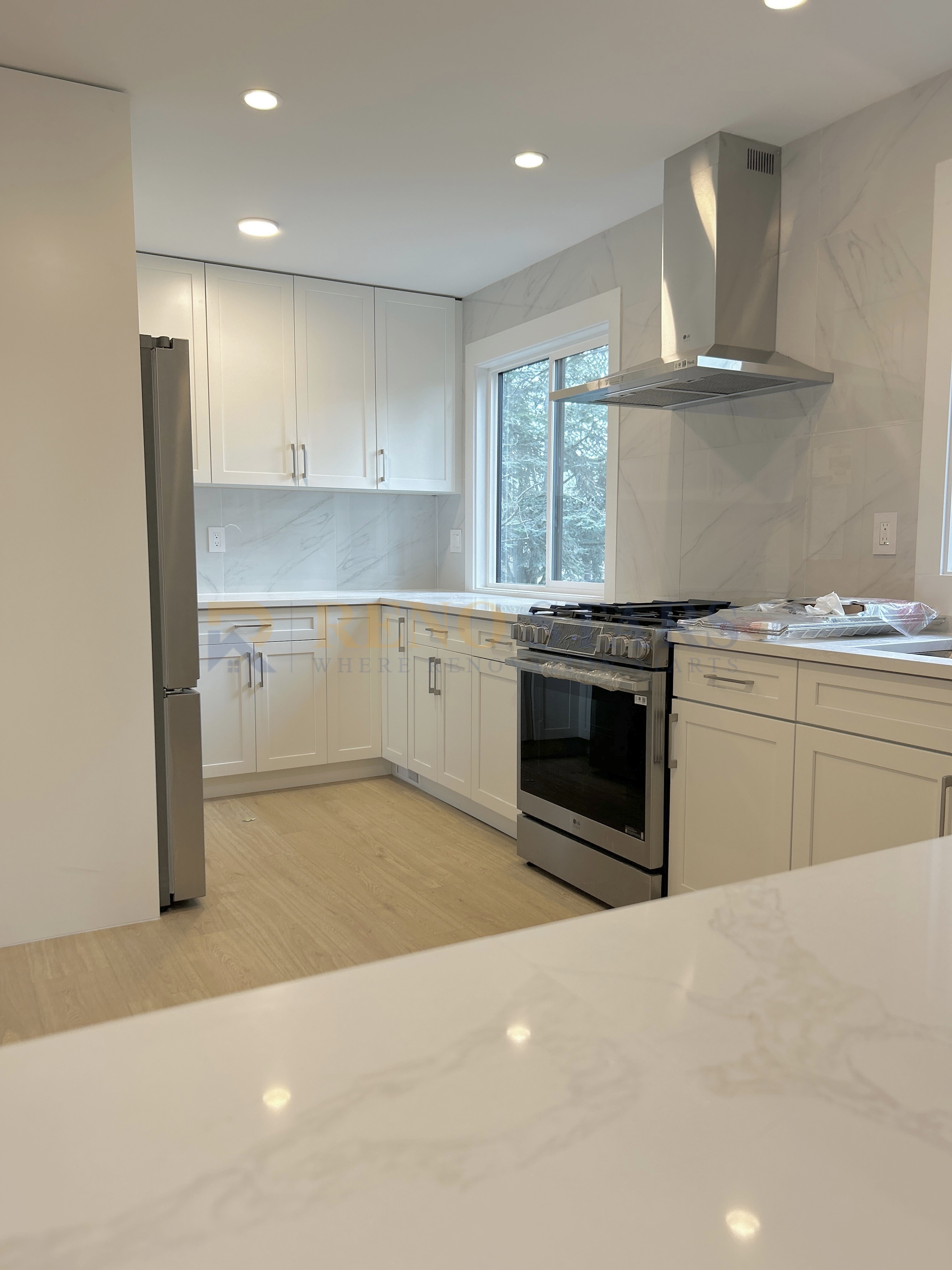 Stunning Kitchen Renovation with White Shaker Cabinets - After 2