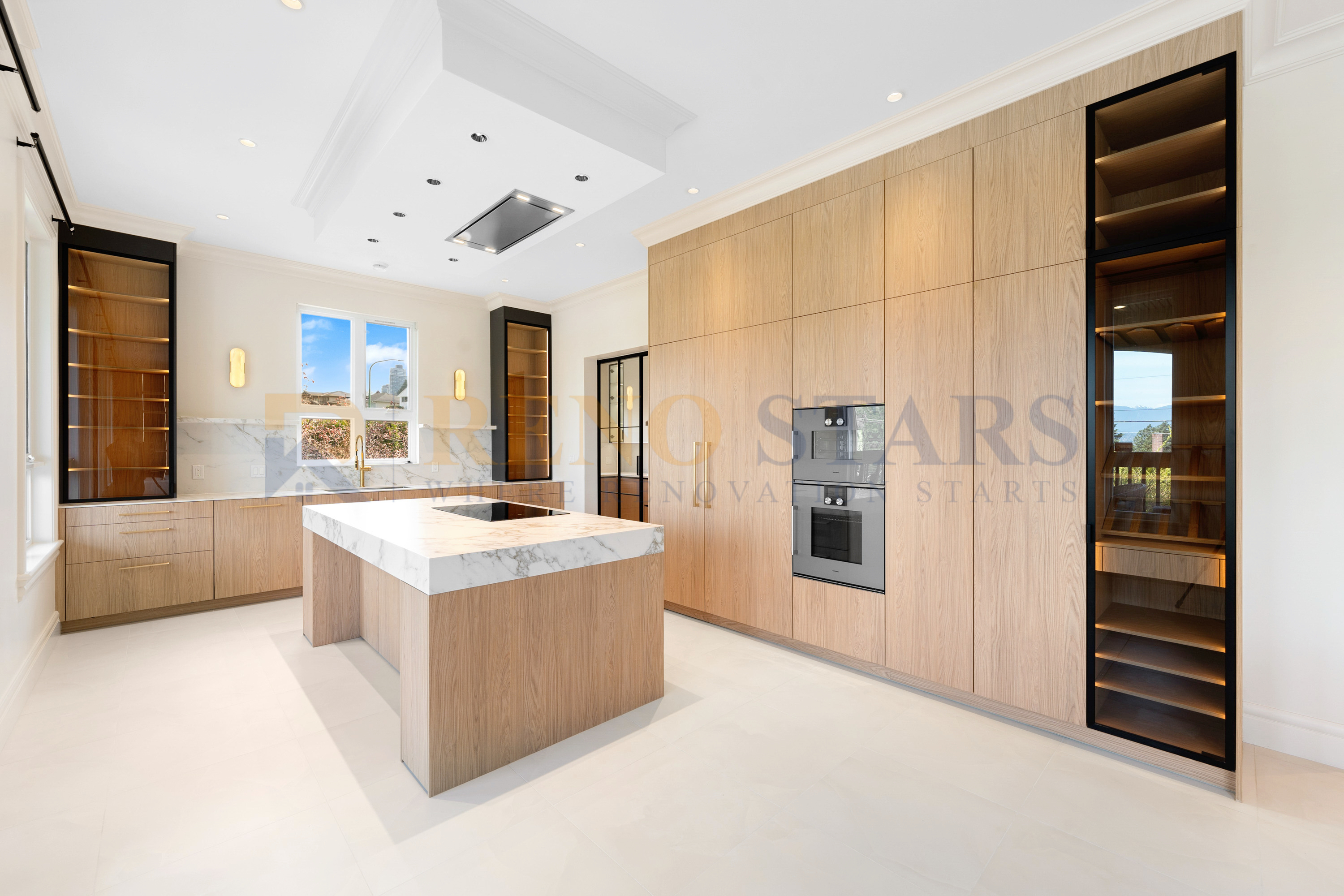 Custom Kitchen Renovation with Gold Fixtures