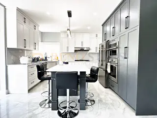 Kitchen Renovation with Waterfall Quartz Island in Coquitlam