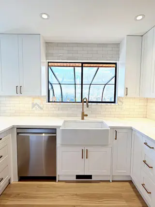 Kitchen Renovation with Apron Sink and Quartz Waterfall in Delta