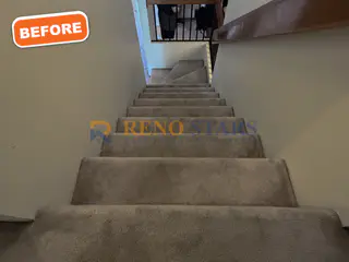 Carpeted staircase before renovation
