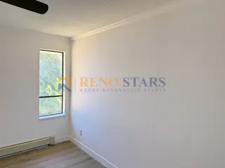 Clean bright bedroom with LVP flooring