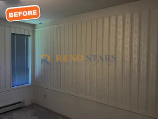 Wallpapered bedroom before renovation